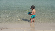 Cute Kid Playing In The Sea, Super Slow Motion