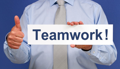 Wall Mural - Teamwork oder Teamarbeit