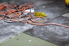 Coils Of Electrical Cable Lying On Floor Workplace