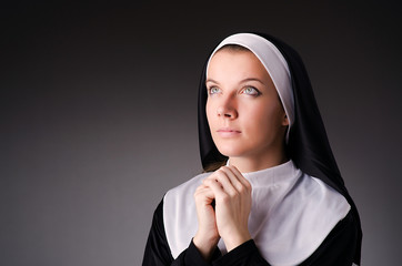 Wall Mural - Young nun in religious concept