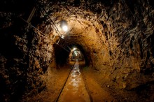 Underground Mine Passage With Rails