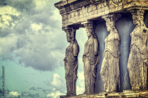 Fototapeta na wymiar Caryatids in Erechtheum from Athenian Acropolis,Greece