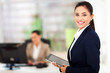 © michaeljung - modern businesswoman holding tablet computer