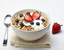 Bowl Of Healthy Muesli With Yogurt And Fresh Berries