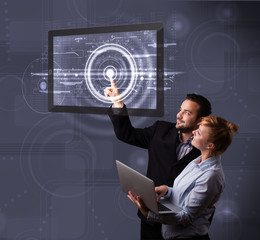 Poster - Young couple touching modern technology tablet
