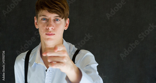 Fotomural Your country needs you pointing man on blackboard background