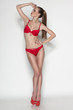 © paffy - Sexy woman in red bikini in full length posing