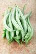 Green fresh beans on cutting board