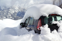 Car Burried Under Snow In Alps