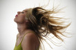 © grufnar - woman with hair flying in the air