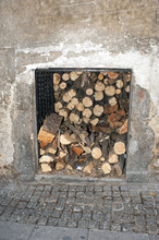 A Small Storage Closet With Firewood