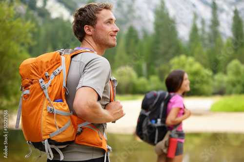 Fotografie, Obraz Hikers - people hiking, man looking in Yosemite