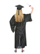 © Alliance - Full length portrait of woman in graduation gown with diploma