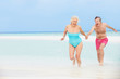© Monkey Business - Senior Couple Having Fun In Sea On Beach Holiday