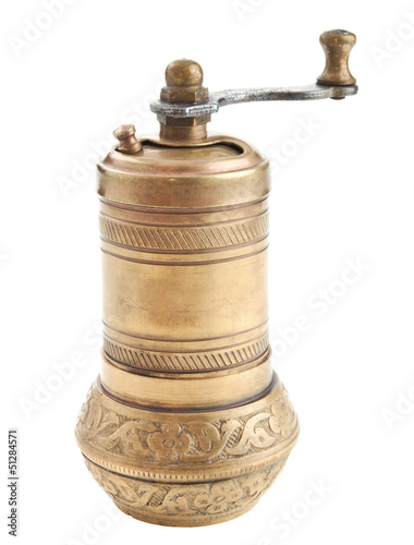 Fotografía vintage bronze pepper mill isolated on white