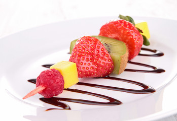 Wall Mural - fruit skewer and chocolate sauce