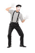 Full length portrait of a male mime artist performing