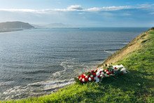 Memorial Flowers Because A Dead At Sea