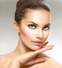 Wall Mural - beauty portrait. beautiful spa woman touching her face