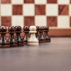 Wall Mural - chess leadership concept over chessboard background