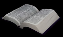 Open Bible To Psalm 118 Isolated On A Black Background.