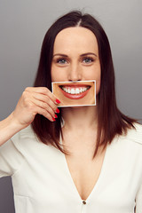 Sticker - woman hiding her emotions behind smile