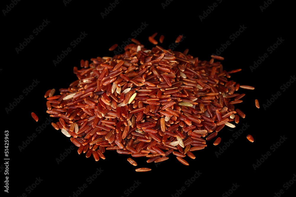 Red rice isolated on black