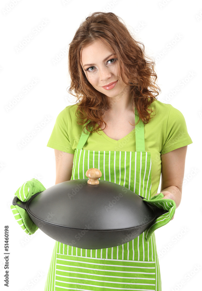 Young woman wearing kitchen apron with wok pan, isolated