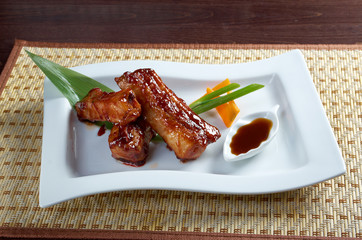 Canvas Print - roasted pork ribs in a plate