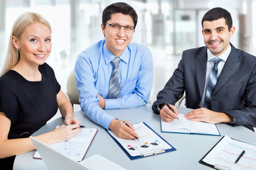 Wall Mural - Business people working at meeting