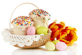 Fototapeta Storczyk - Easter cake with eggs in wicker basket isolated on white