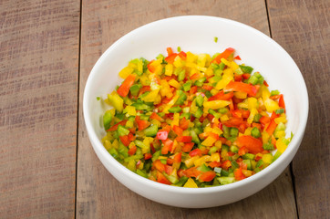 Bowl of freshly diced red yellow peppers