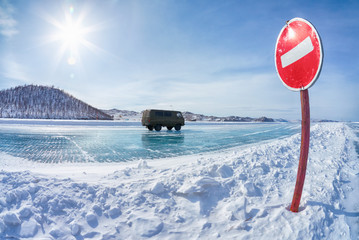 Fototapete - Traffic sign on Baikal ice