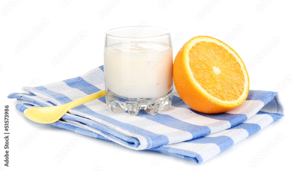 Delicious yogurt in glass with orange isolated on white