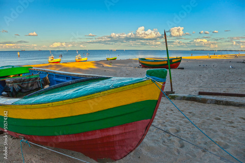 Fototapeta na wymiar Fishing boats on the beach in Sopot, Polad.