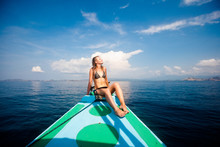 Young Sexy Woman In Bikini Enjoying The Sun On The Boat