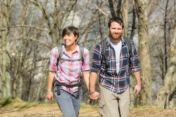 Poster - Young Couple Hiking in the Nature