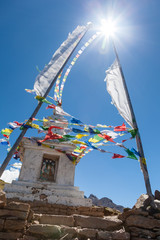 Sun and wind over Buddhist stupa