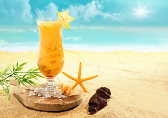 Colourful carambola and orange cocktail