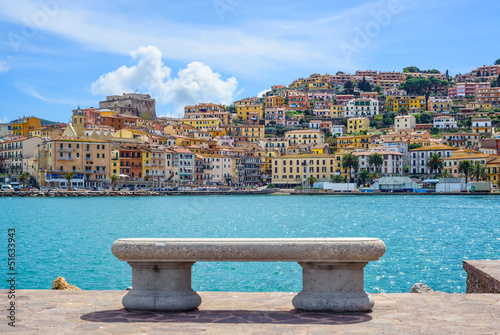 Fototapeta na wymiar Bench on seafront in Porto Santo Stefano, Argentario, Tuscany, I