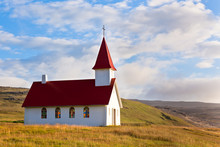 Typical Rural Icelandic Church Under A Blue Summer Sky