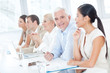 © LStockStudio - Senior Businessman in a Meeting