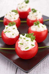 Wall Mural - appetizer, stuffed tomato with cheese