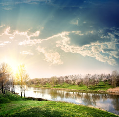 Wall Mural - Sunset over the river