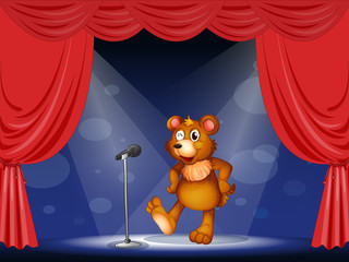 Poster - A stage with a bear performing