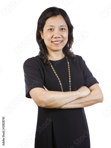 Fotografie, Obraz Mature Asian Woman in Business attire standing relaxed