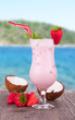 Summer drink with blur beach on background 