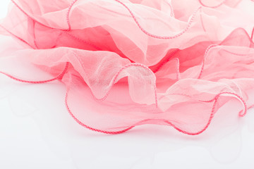 pink silk scarf.