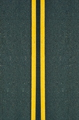 Double Yellow Lines on road.