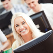© LStockStudio - Smiling Student in Computer Lab